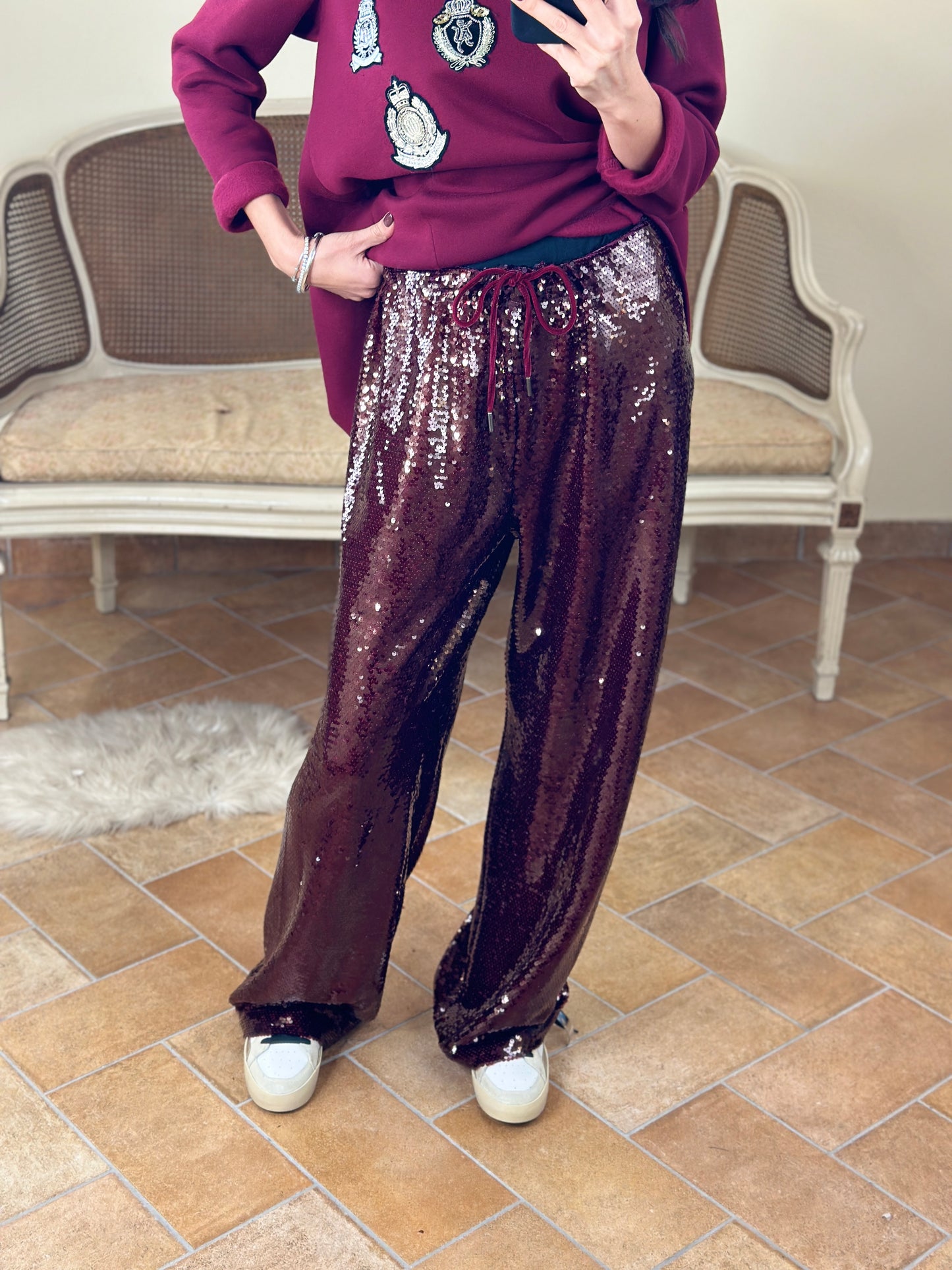 Tensione in Pantalone con paillettes bordeaux a palazzo